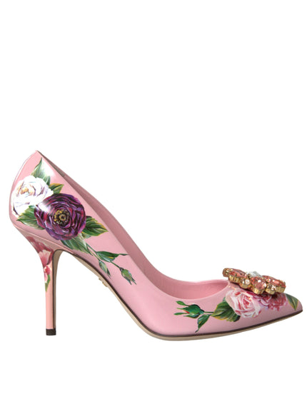 a pink high heeled shoe with flowers painted on it