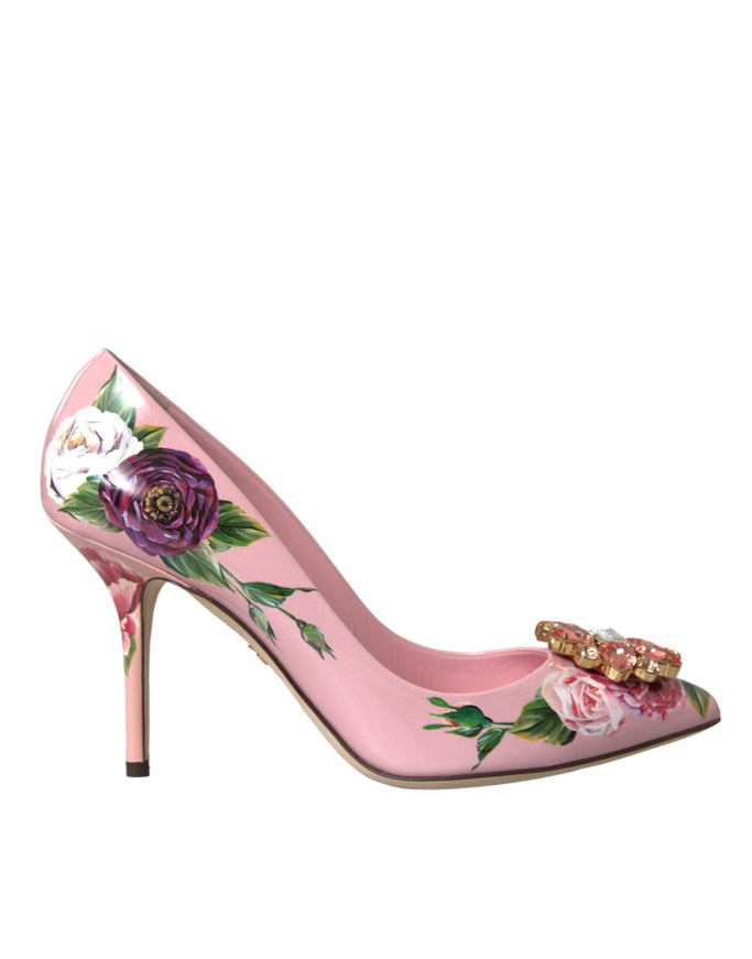 a pink high heeled shoe with flowers painted on it