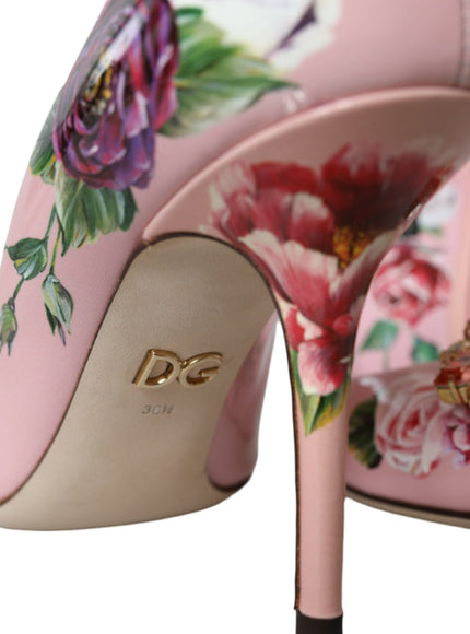 a pair of pink high heels with flowers on them