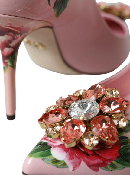 a pair of pink high heels with a flower brooch