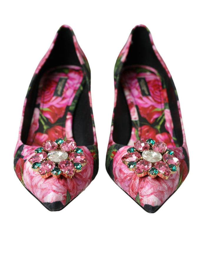 a pair of pink shoes with flowers on them