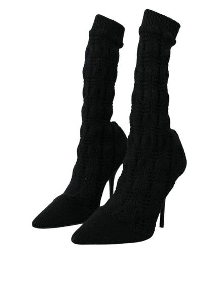 a pair of black high heeled shoes