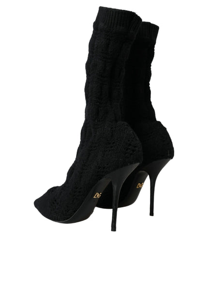 a pair of black high heeled shoes