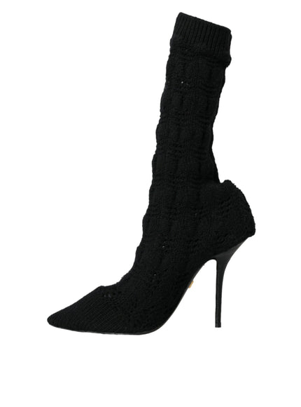 a pair of black high heeled shoes