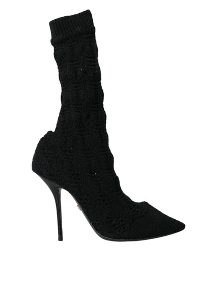 a pair of black high heeled shoes