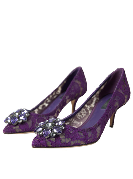 a pair of purple high heels with a jeweled buckle