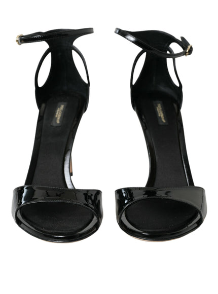 a pair of black high heeled shoes