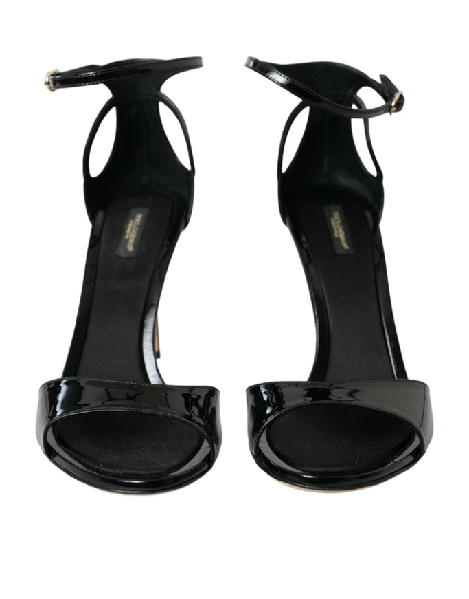 a pair of black high heeled shoes