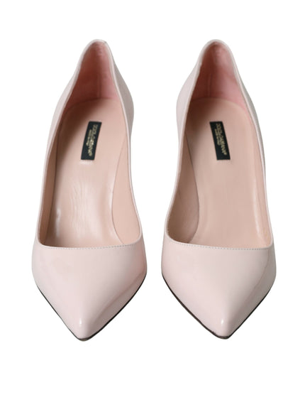 a pair of pink high heels on a white background