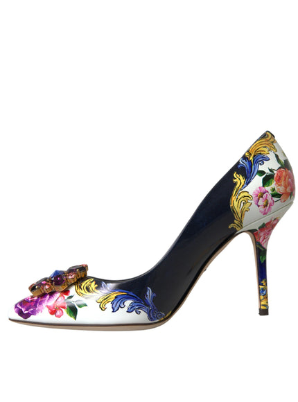 a high heeled shoe with flowers painted on it