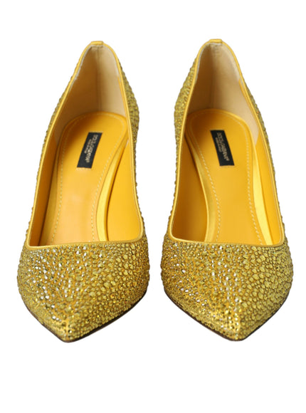 a pair of yellow high heeled shoes