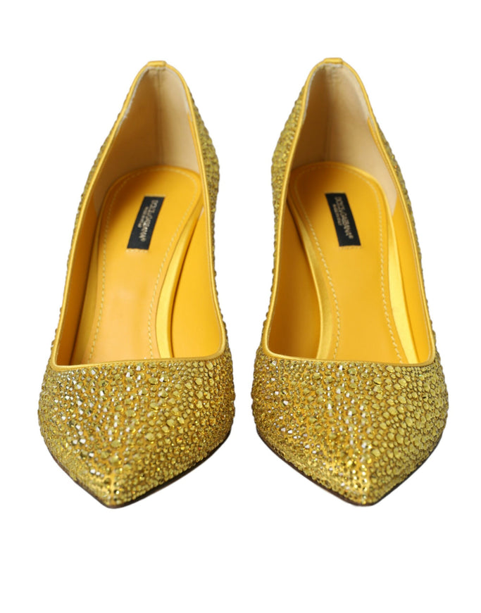 a pair of yellow high heeled shoes