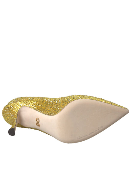 a pair of yellow shoes with gold glitter