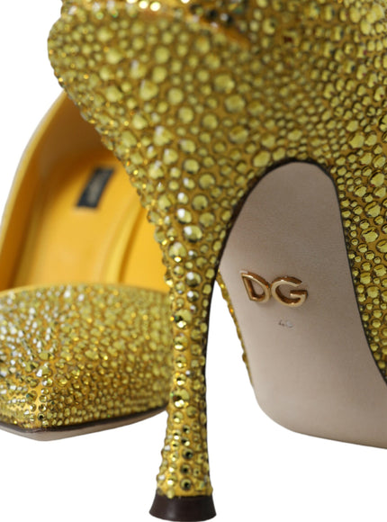 a pair of yellow high heels with gold sequins