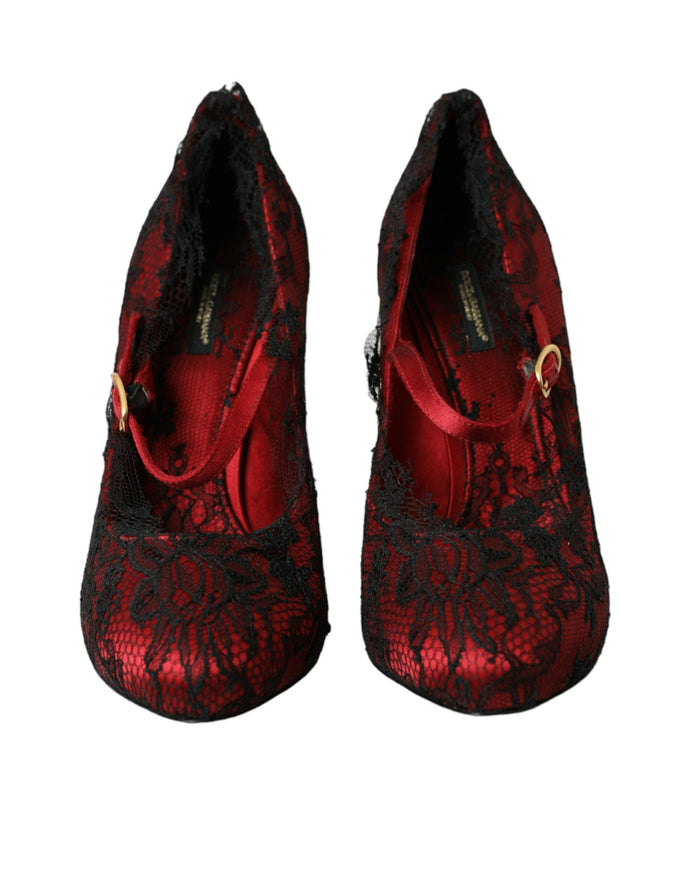 a pair of red shoes with black lace