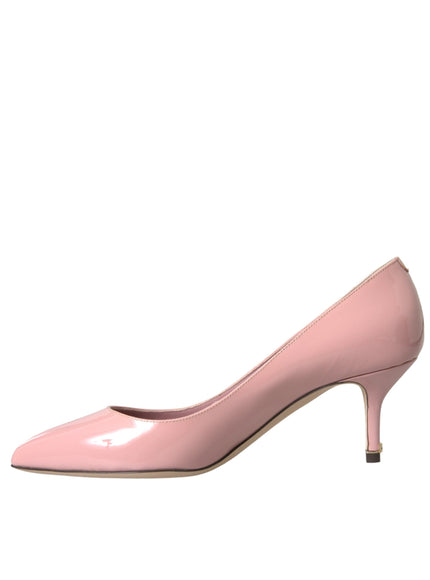 a pink high heeled shoe on a white background