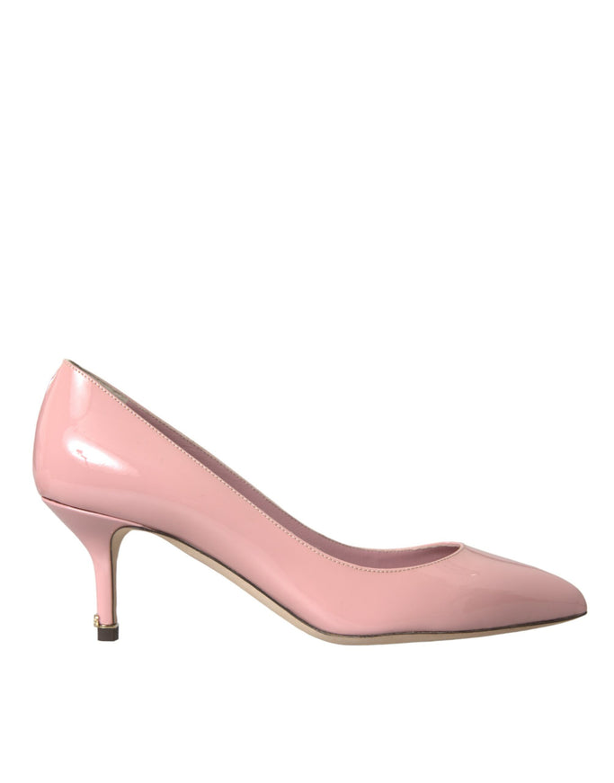 a pink high heeled shoe on a white background