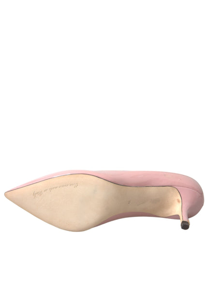 a woman's pink shoe with a pointed toe