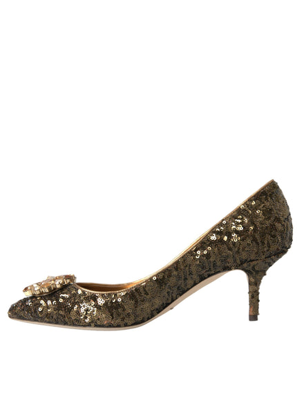 a women's shoe with gold sequins and a bow