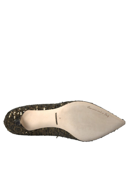 a woman's shoe with sequins on the bottom