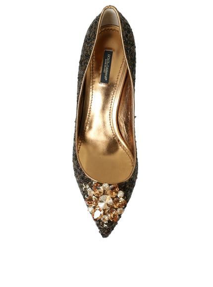 a pair of shoes with gold and black glitters