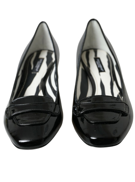 a pair of black and white zebra print shoes