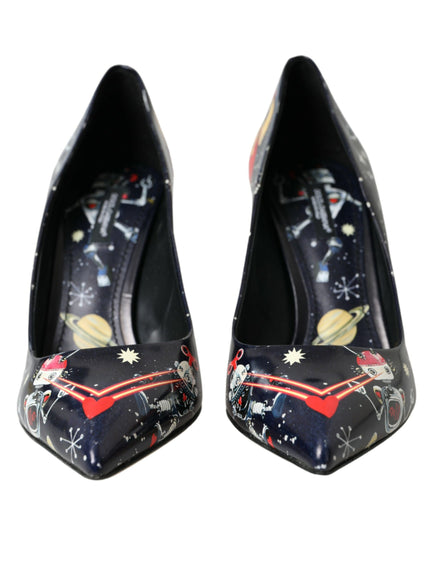 a pair of black shoes with stars and planets on them