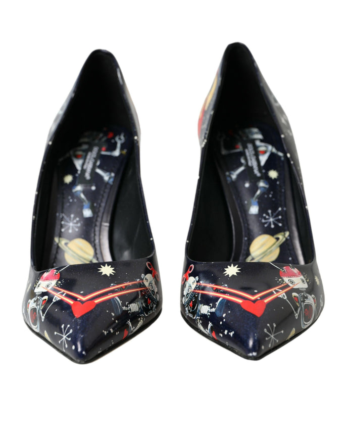 a pair of black shoes with stars and planets on them