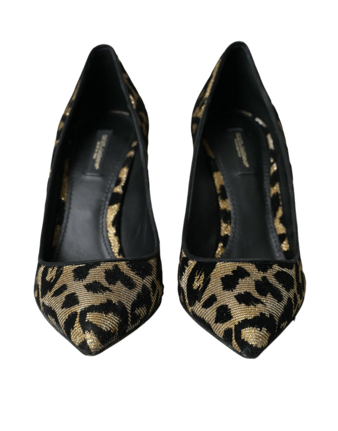 a pair of leopard print shoes on a white background