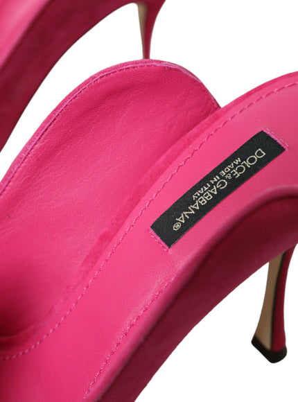 a close up of a pink high heel shoe