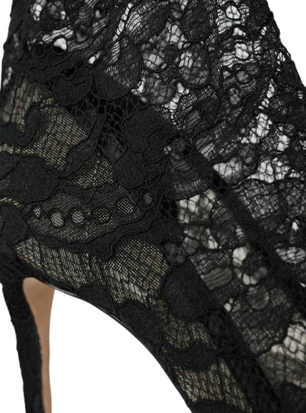 a close up of a black lace shoe