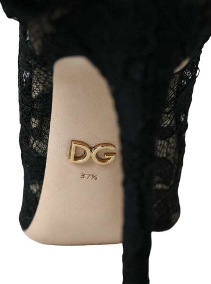 a high heeled shoe with a gold logo on the heel