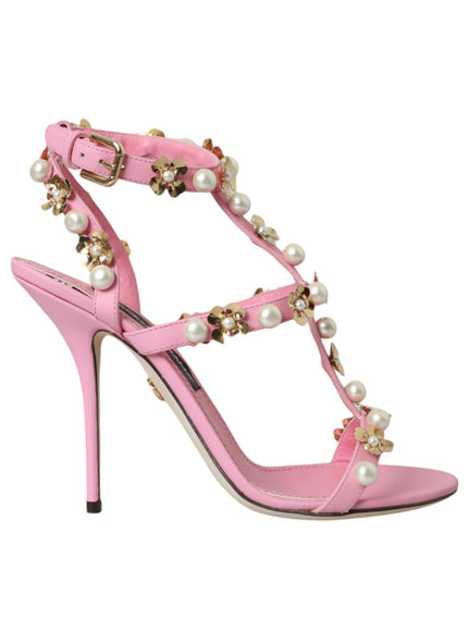 a pink high heeled sandal with pearls