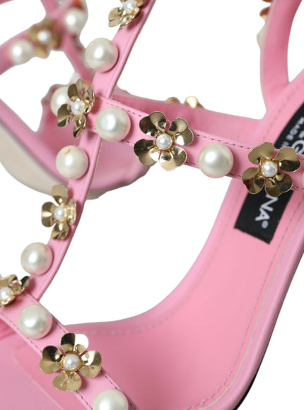 a pair of pink high heels with pearls