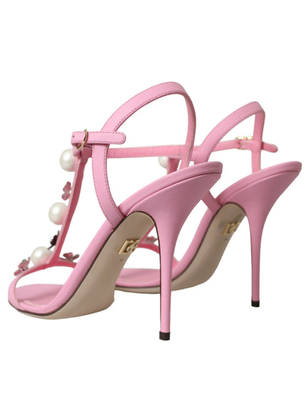 a pair of pink high heels with pearls