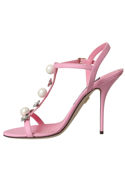 a pink high heeled sandal with pearls