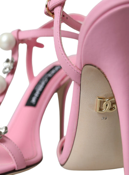 a pair of pink high heels with pearls