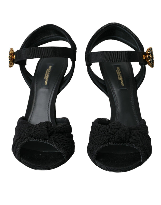 a pair of black high heeled sandals