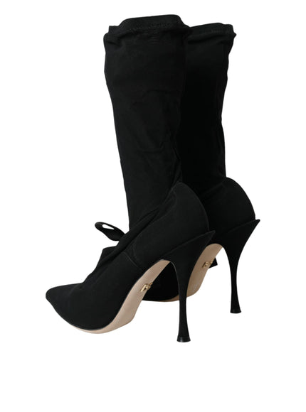 a pair of black high heeled shoes