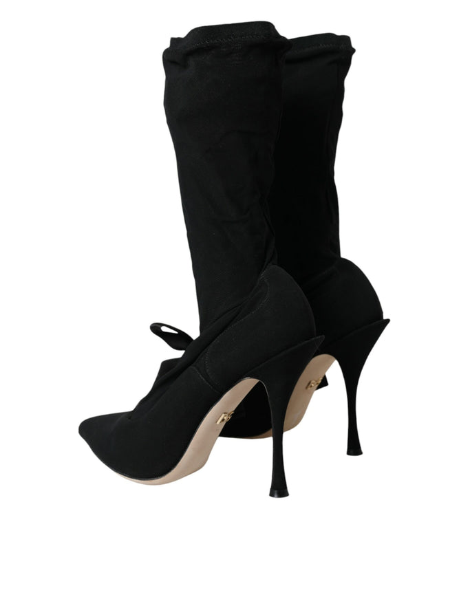 a pair of black high heeled shoes