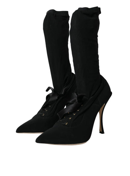 a pair of black high heeled shoes