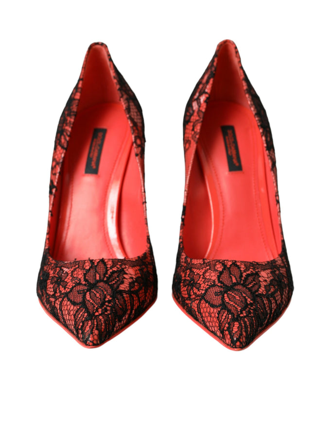 a pair of red and black lace shoes