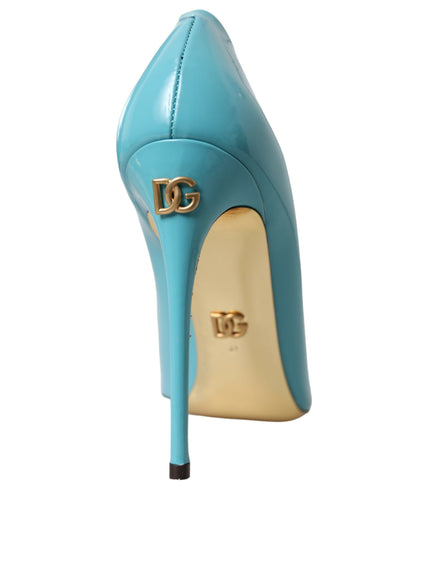 a blue high heeled shoe with a gold buckle