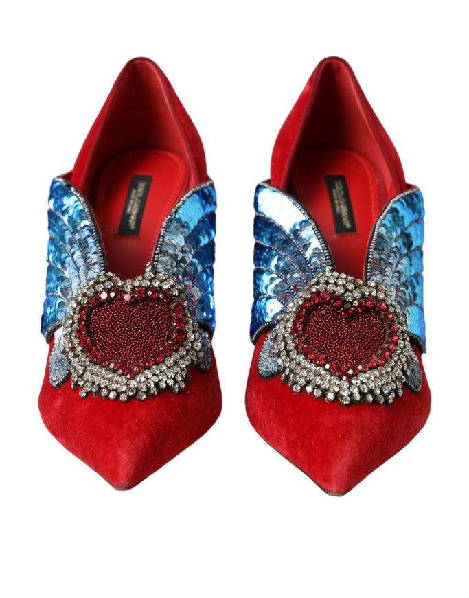 a pair of red shoes with blue and silver decorations