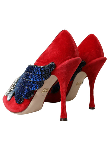 a pair of red high heels with blue sequins