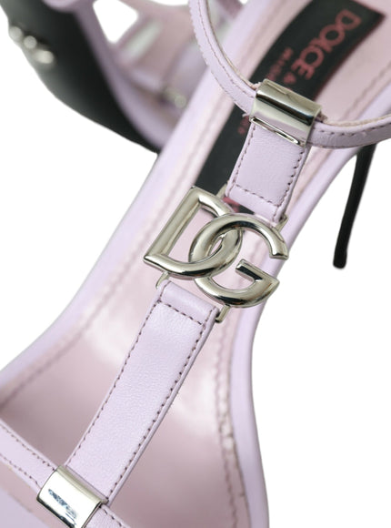 a pink high heeled shoe with a metal buckle