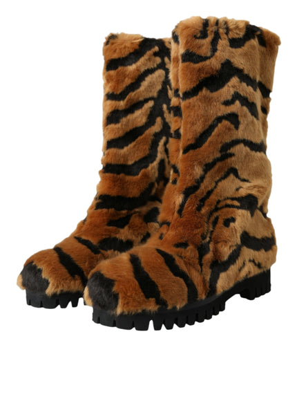 a pair of boots with a tiger pattern