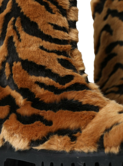 a close up of a pair of animal print boots