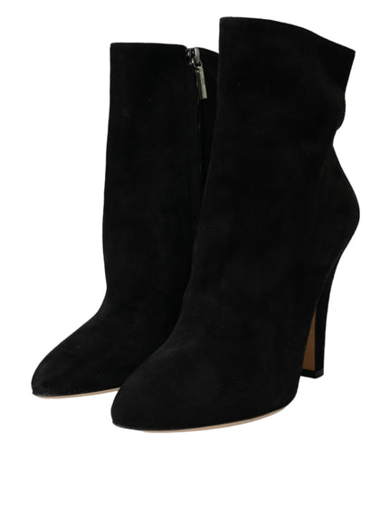 a pair of black high heeled boots