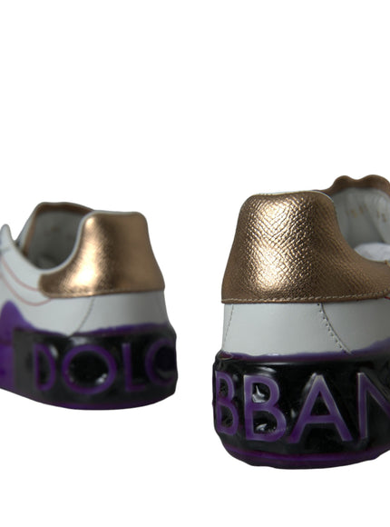 a pair of white and purple shoes with black lettering